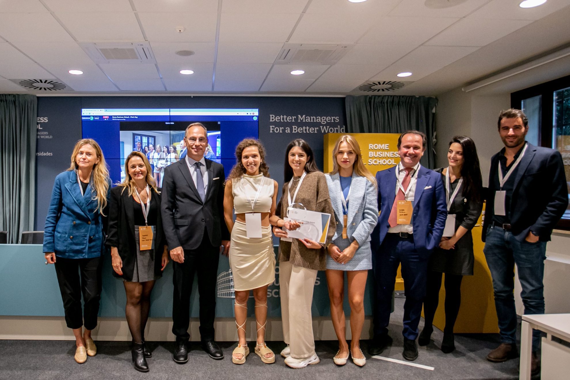 rome business school students posing for pitch day on campus